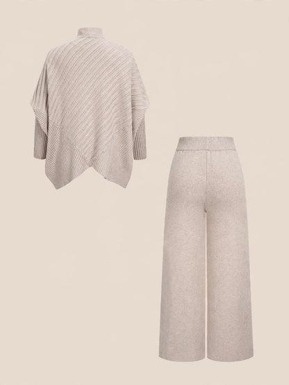 Compleu din 2 piese, bluză tricotată asimetrică cu guler înalt și pantaloni wide-leg cu talie înaltă - crem